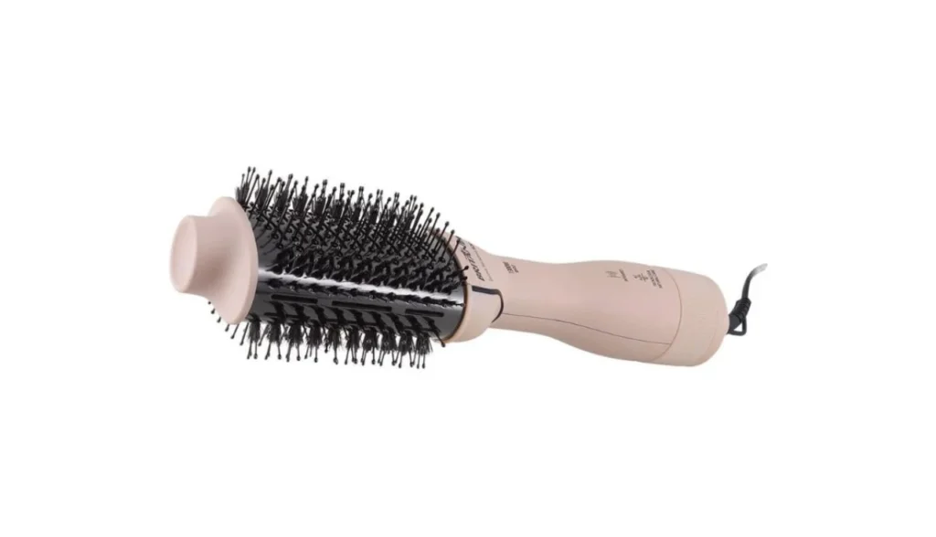 Escova Secadora Britânia Soft 4 em 1 BEC07R deitada, destacando a escova cilíndrica e detalhes do design